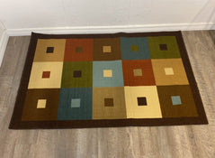 used At Home Area Rug