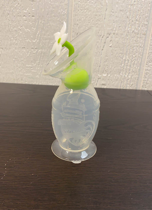 Shop Haakaa Silicone Breast Pump And Flower Stopper Set at GoodBuy Gear