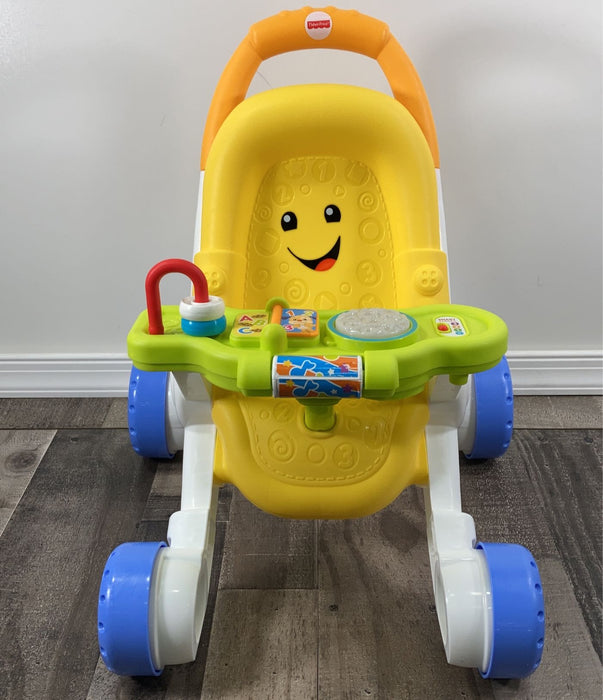 used Fisher Price Stroll & Learn Walker