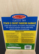 secondhand Melissa & Doug Stack and Count Parking Garage