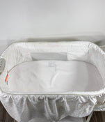 used Delta Children Deluxe Gliding Bassinet