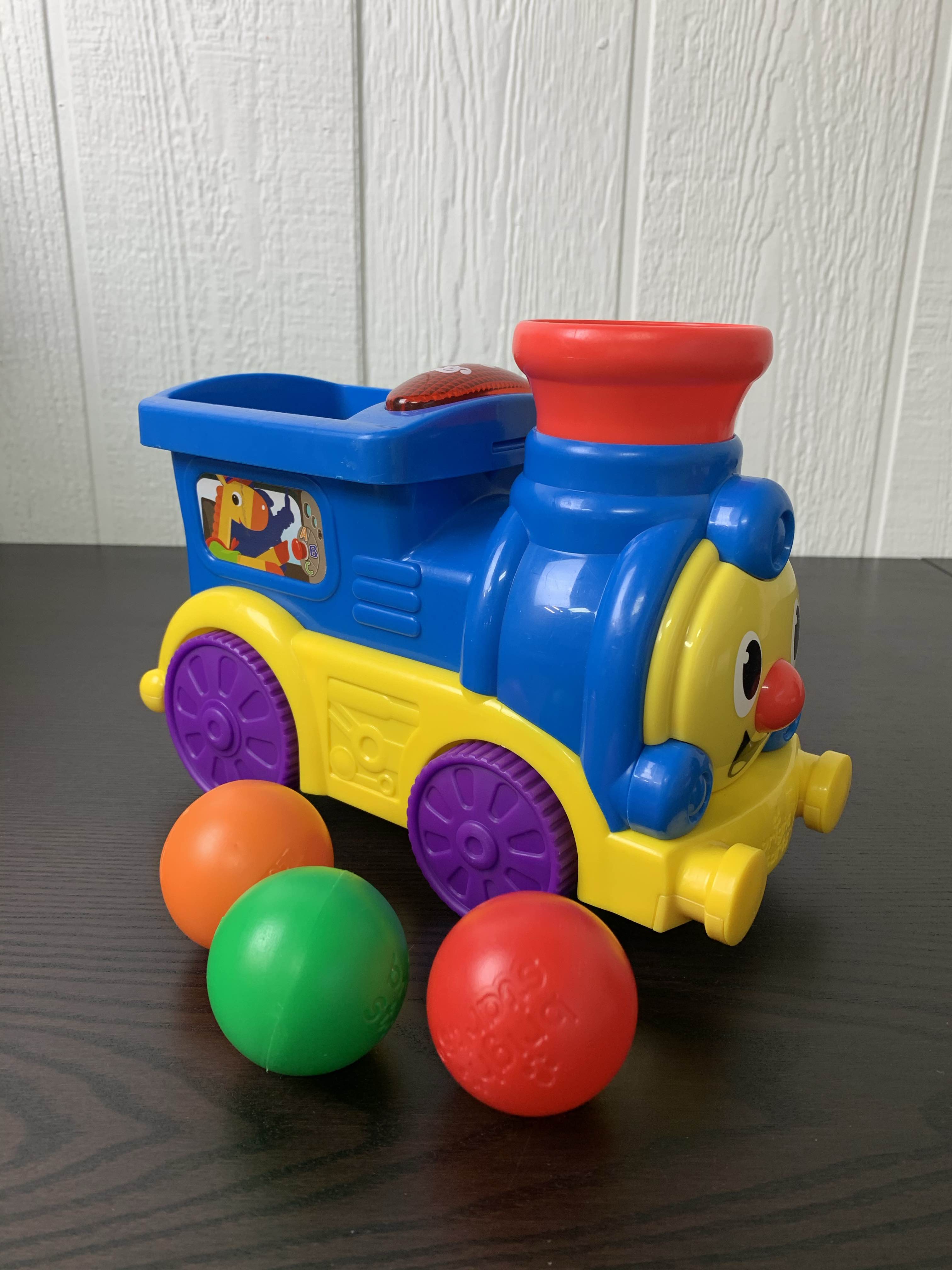 Bright starts roll sales & pop train toy