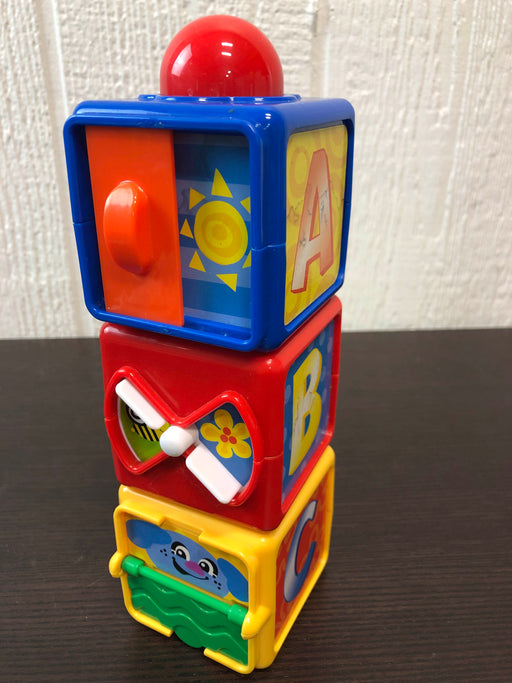 secondhand Fisher Price Brilliant Basics Stacking Action Blocks