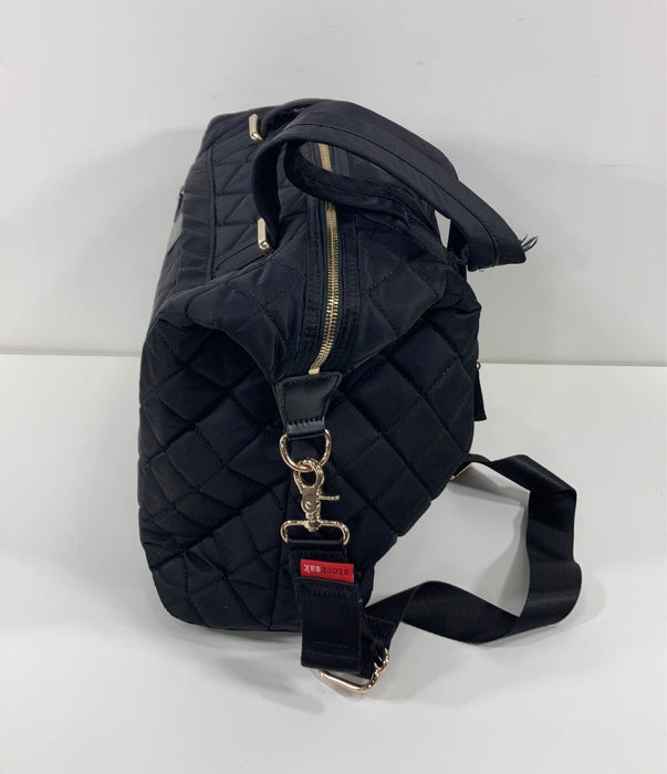 Shop StorkSak Stevie Quilt Diaper Bag, Black at GoodBuy Gear