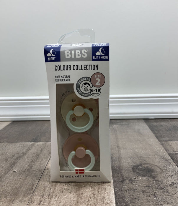 Shop BIBS 2-Pack Pacifiers, Size 2 (6+ months), Glow in the Dark Ivory/Blossom at GoodBuy Gear