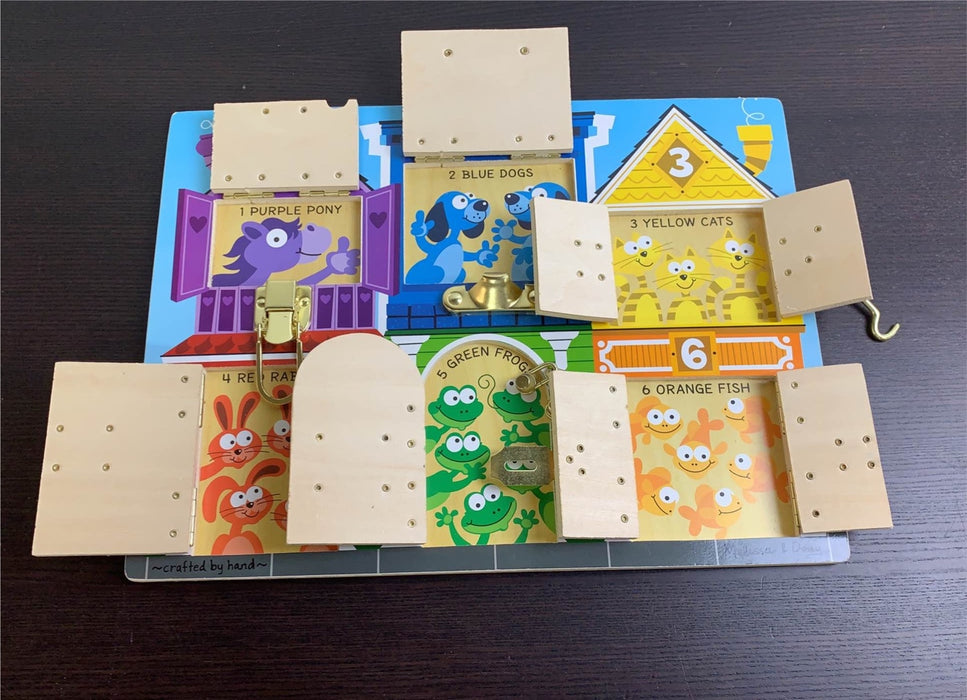 secondhand Melissa & Doug Latches Board