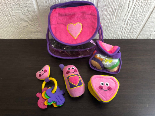 used Melissa & Doug Fill & Spill Purse