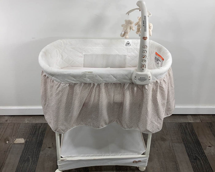 used Delta Children Deluxe Gliding Bassinet