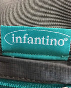 used Infantino Carry On Multi Pocket Carrier