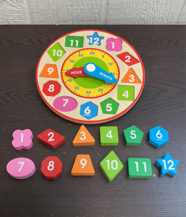 secondhand Melissa & Doug Shape Sorting Clock