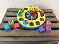 secondhand Melissa & Doug Shape Sorting Clock