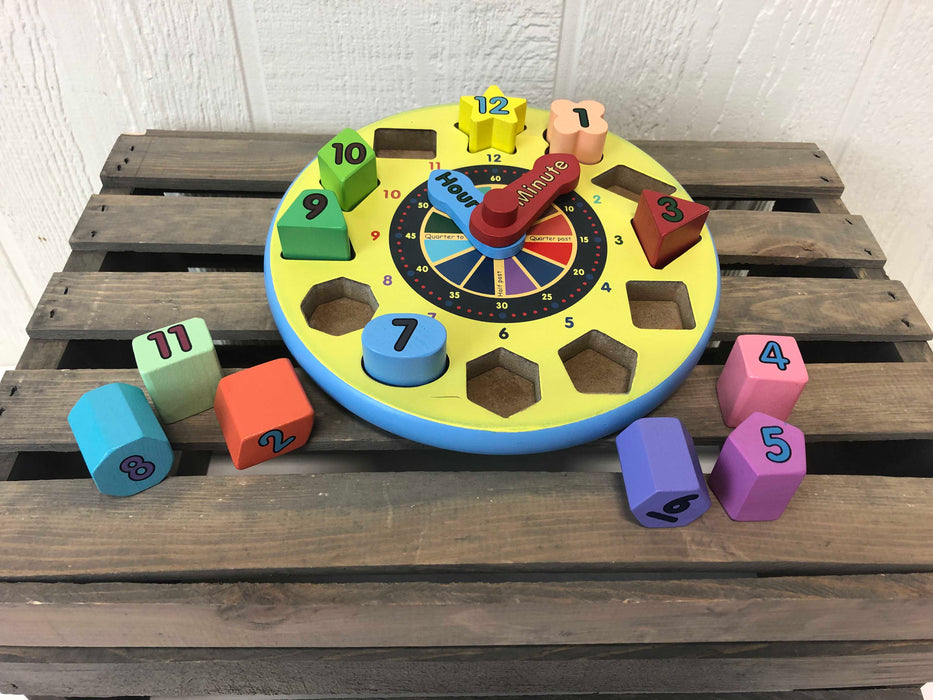secondhand Melissa & Doug Shape Sorting Clock