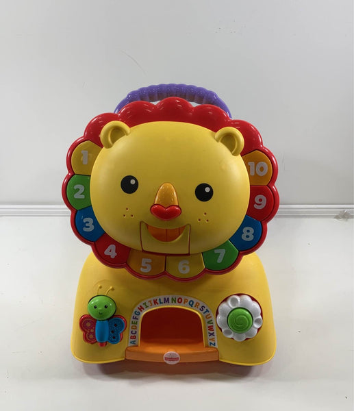 Fisher price lion 2024 ride on toy