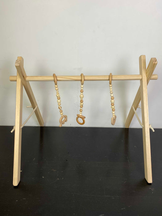 used Poppyseed Play Wooden Baby Gym