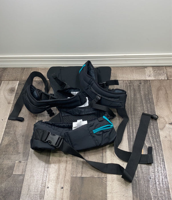 secondhand Infantino Carry On Multi Pocket Carrier