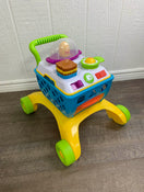 used Bright Starts Giggling Gourmet Shop ‘n Cook Walker