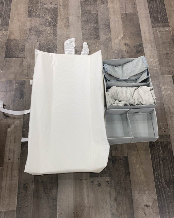 used Delta Children 7-Piece Essential Changing Table Bundle