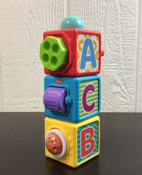 Fisher price stacking action hot sale blocks