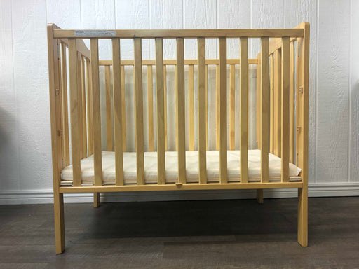 used Delta Children Mini Folding Portable Crib