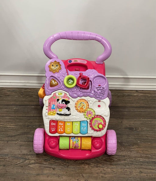 used VTech Sit-To-Stand Learning Walker, pink/purple