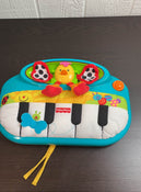 secondhand Fisher Price Kick N Play Crib Piano