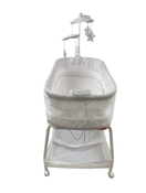 secondhand Delta Children SmartSleep Auto-Glide Bassinet