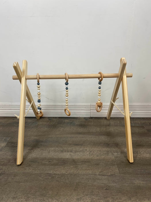 used Poppyseed Play Wooden Baby Gym