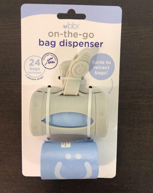 used Ubbi On The Go Bag Dispenser, Lavender