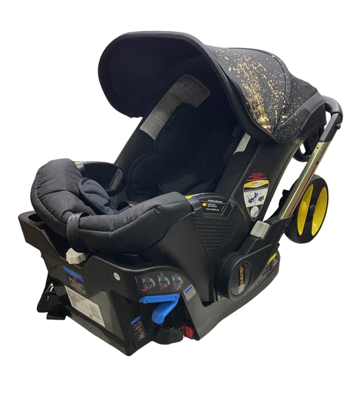 used Doona Infant Car Seat & Stroller Combo, 2022, Gold