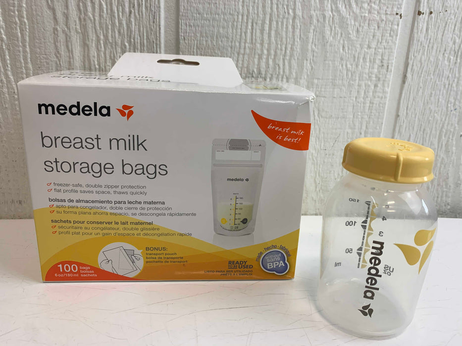 used Medela Milk Storage Bags, + Bottle