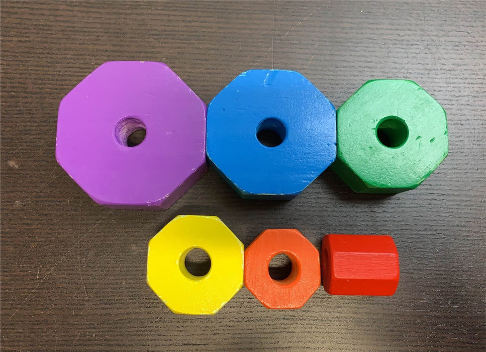 secondhand Melissa & Doug Geometric Stacker