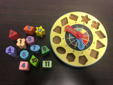 secondhand Melissa & Doug Shape Sorting Clock