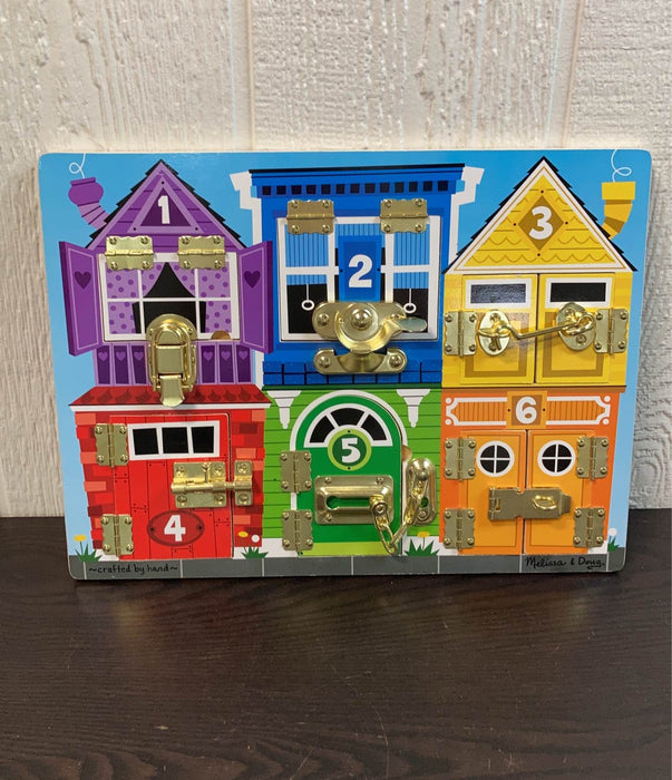 used Melissa & Doug Latches Board