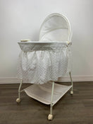 used Delta Children Deluxe Gliding Bassinet