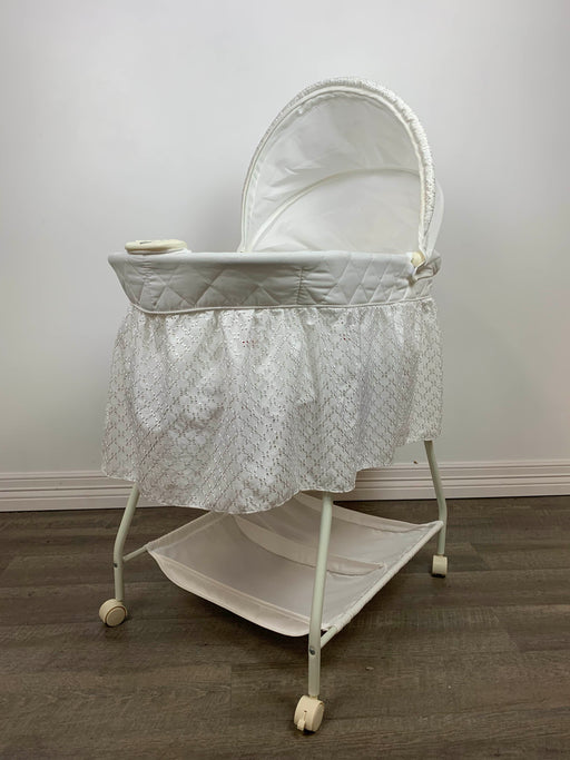 used Delta Children Deluxe Gliding Bassinet