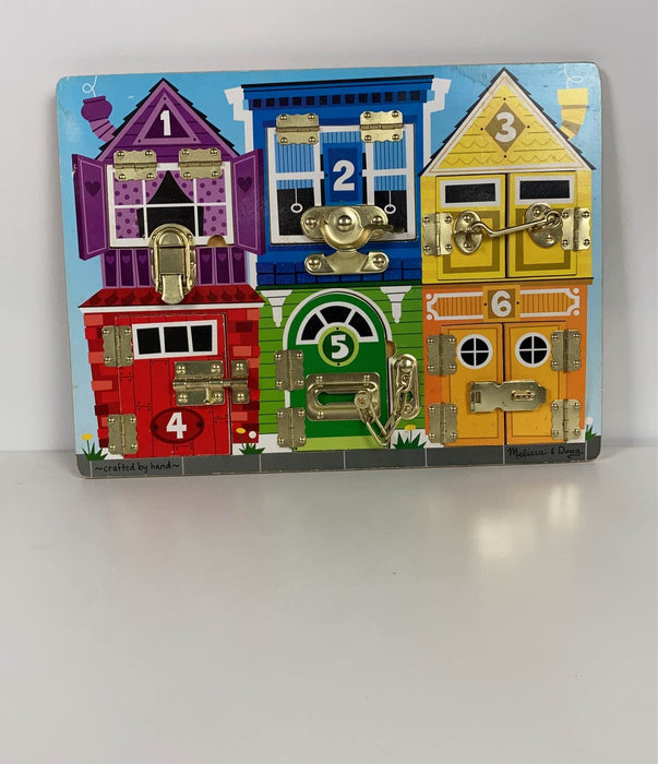 used Melissa & Doug Latches Board