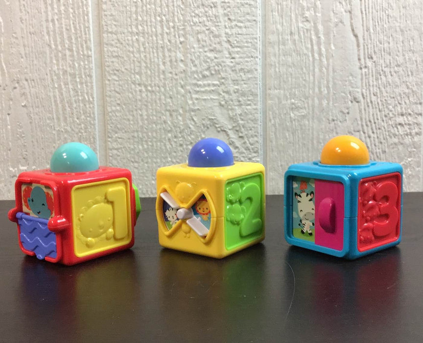 secondhand Fisher Price Brilliant Basics Stacking Action Blocks