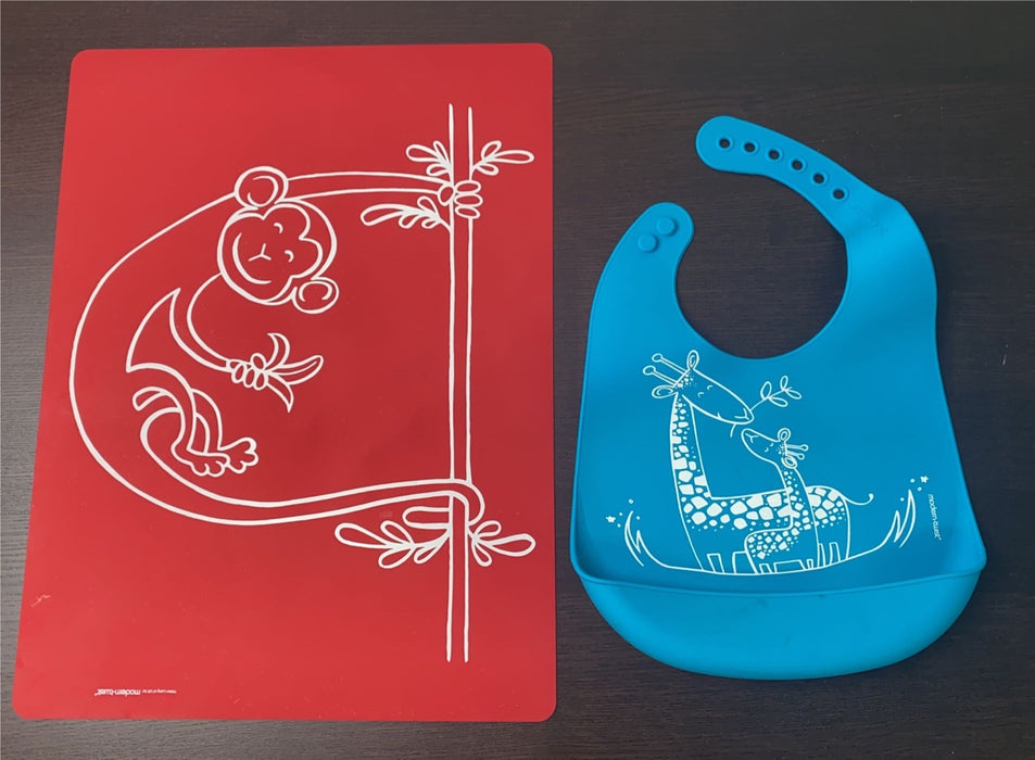 Shop Modern-Twist Silicone Bucket Bib And Feeding Mat at GoodBuy Gear