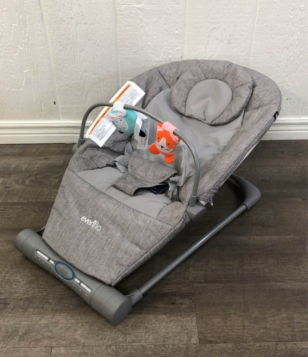 evenflo rock-a-bye swing Evenflo Lyric Musical Bouncer with Toy Bar