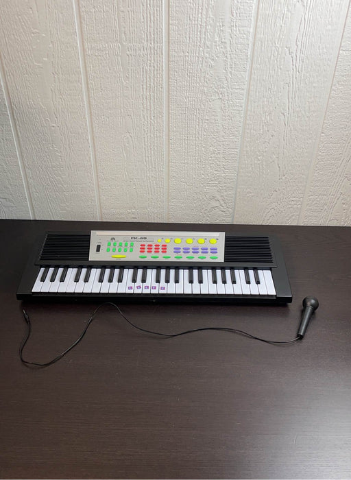 used Audster FK-49 Portable Electronic Keyboard Piano