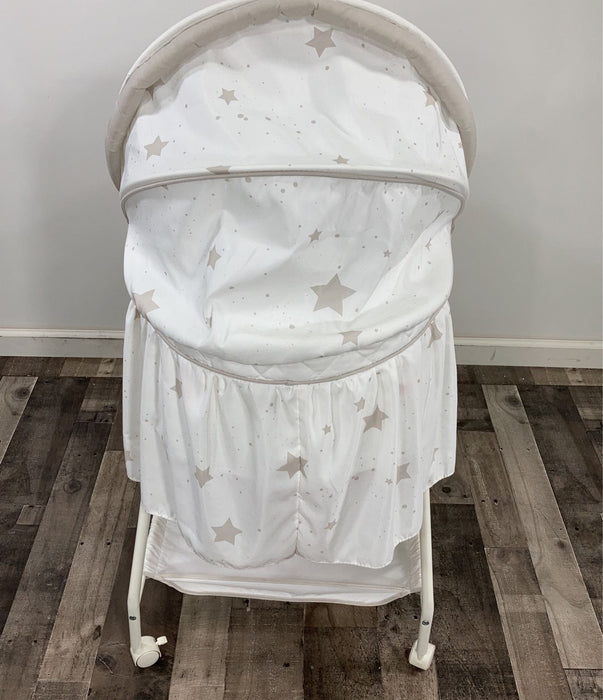 used Delta Children Deluxe Gliding Bassinet