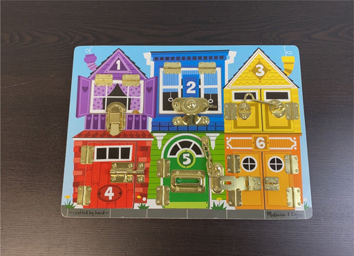 used Melissa & Doug Latches Board