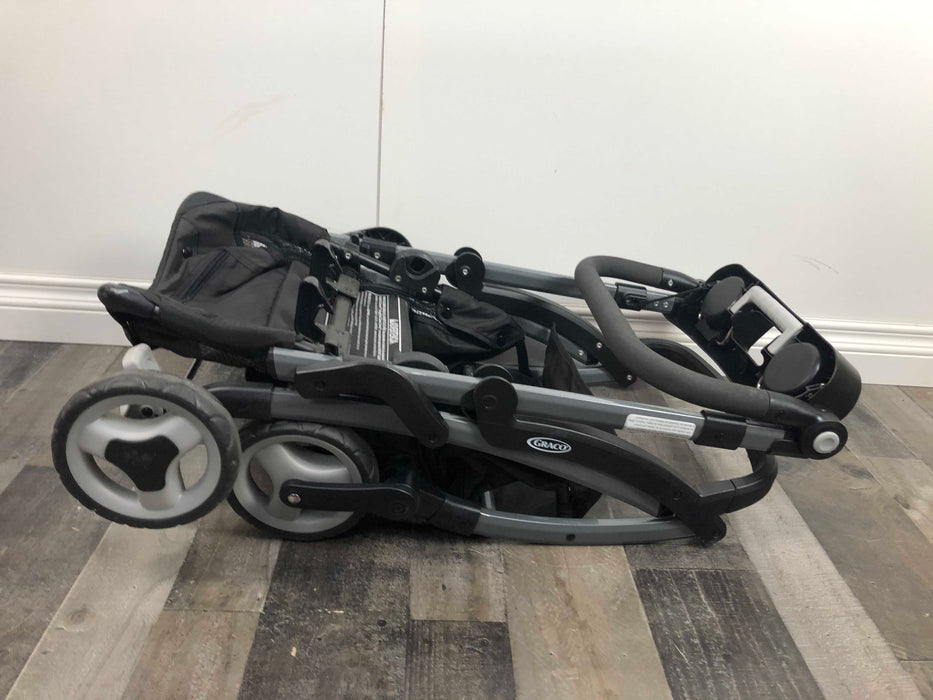 used Graco SnugRider Elite Infant Car Seat Frame Stroller