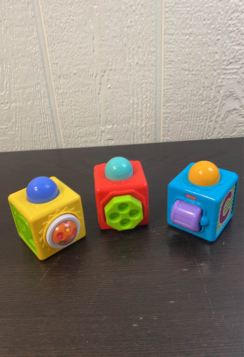 secondhand Fisher Price Brilliant Basics Stacking Action Blocks