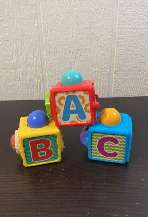 used Fisher Price Brilliant Basics Stacking Action Blocks