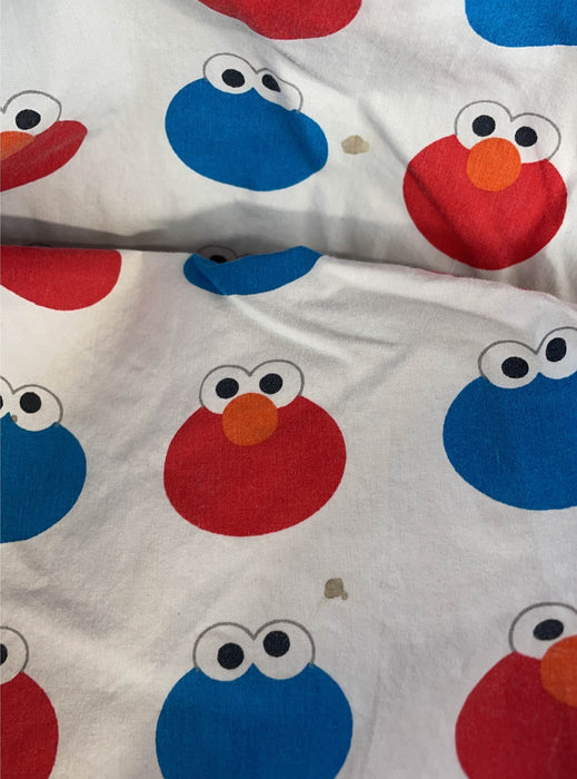 used Sesame Street Elmo/cookie Monster Crib Bedding