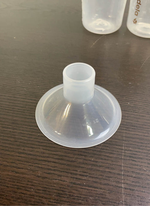 Shop Medela Harmony Manual Breast Pump with Storage Bottles at GoodBuy Gear