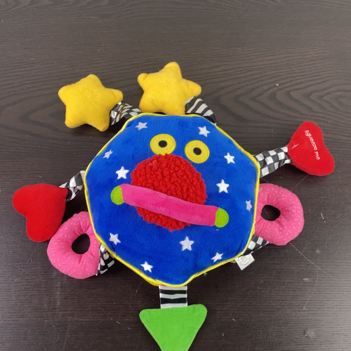 Manhattan Toy Baby Whoozit | Peluche Éveil Sensoriel | 7 Bras Bruyants | Miroir Caché | Dès 6 Mois